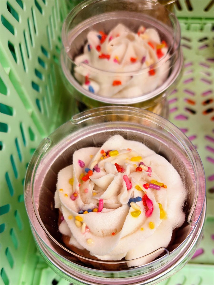Doggo Nice Day pupcakes with mashed potato frosting and colorful sprinkles